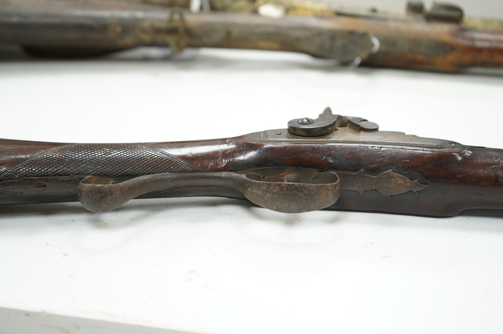 A 12 bore single barrel percussion sporting gun by J. Aston, the drum converted from flintlock, with engraved iron mounts, half stocked